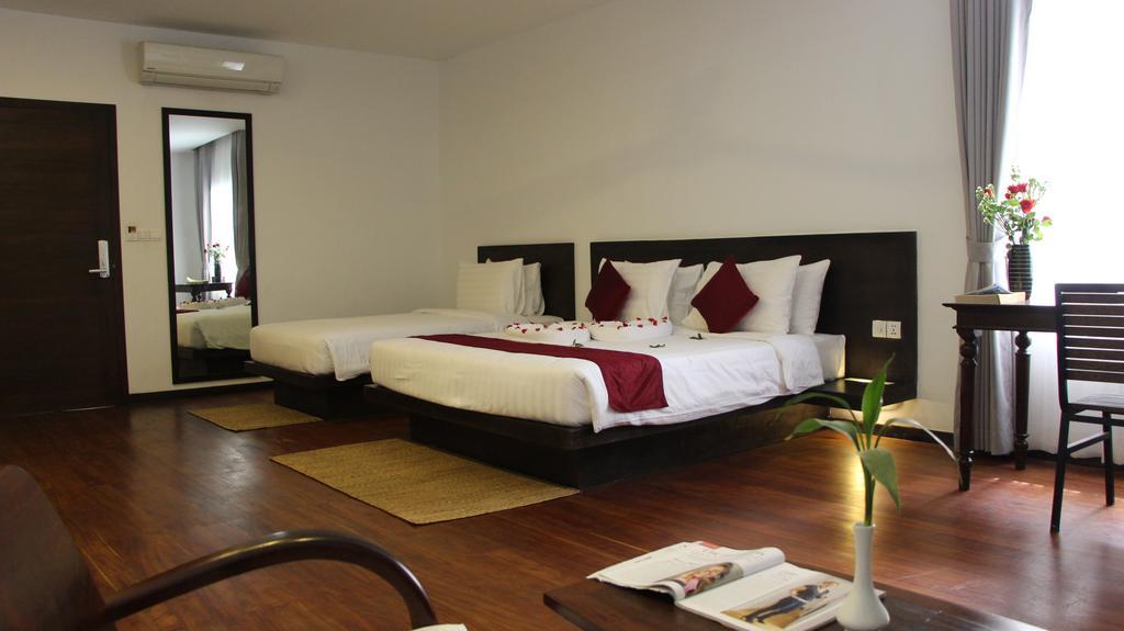 Palm Tree Boutique Hotel พนมเปญ ภายนอก รูปภาพ